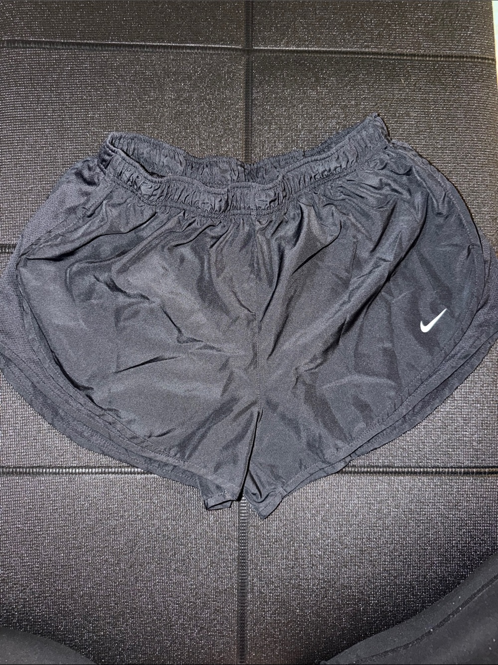 Nike Women’s Black Running Shorts XL runs small, more like a medium